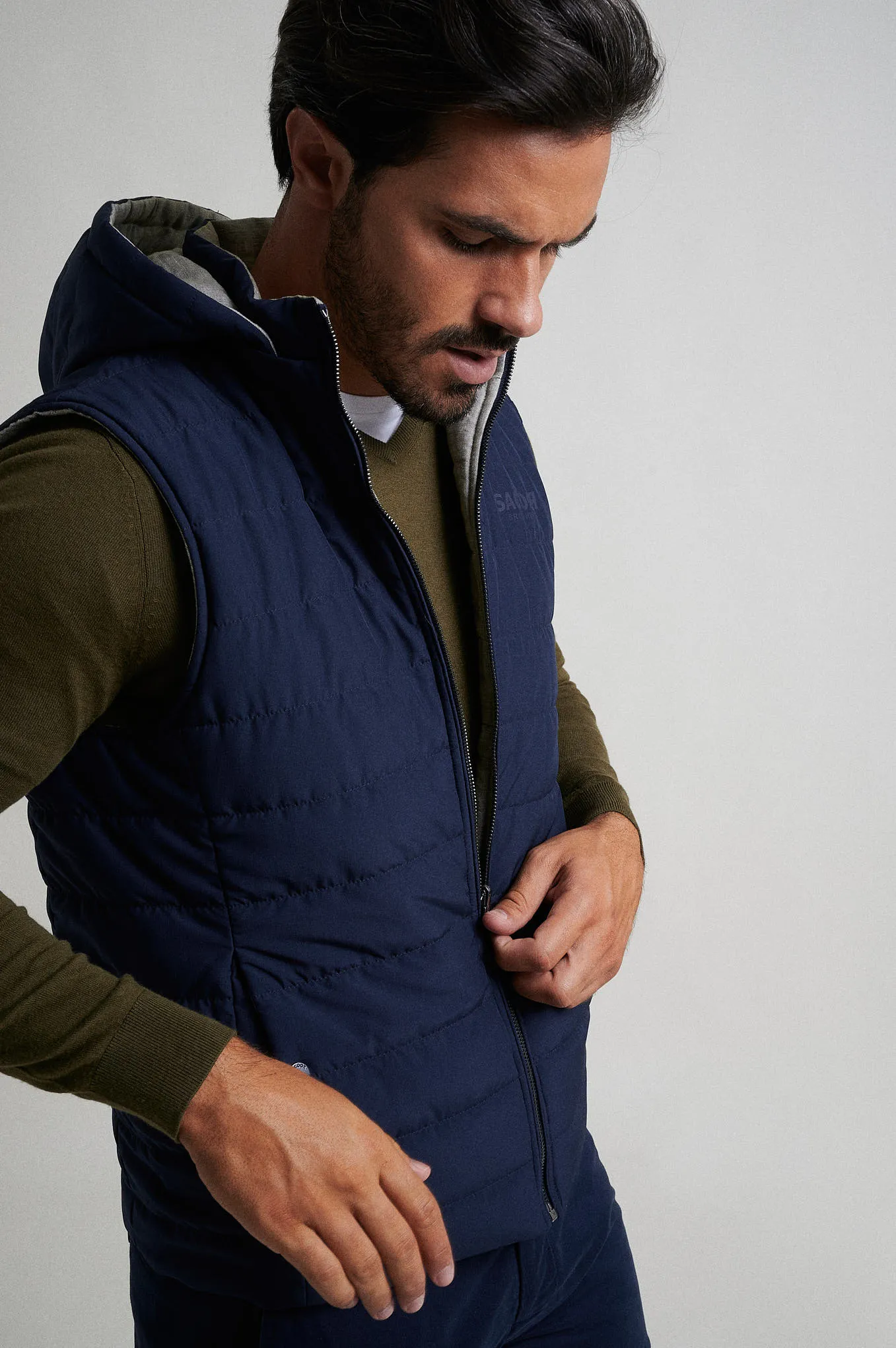 Quilted down vest in recycled polyester Respekt line