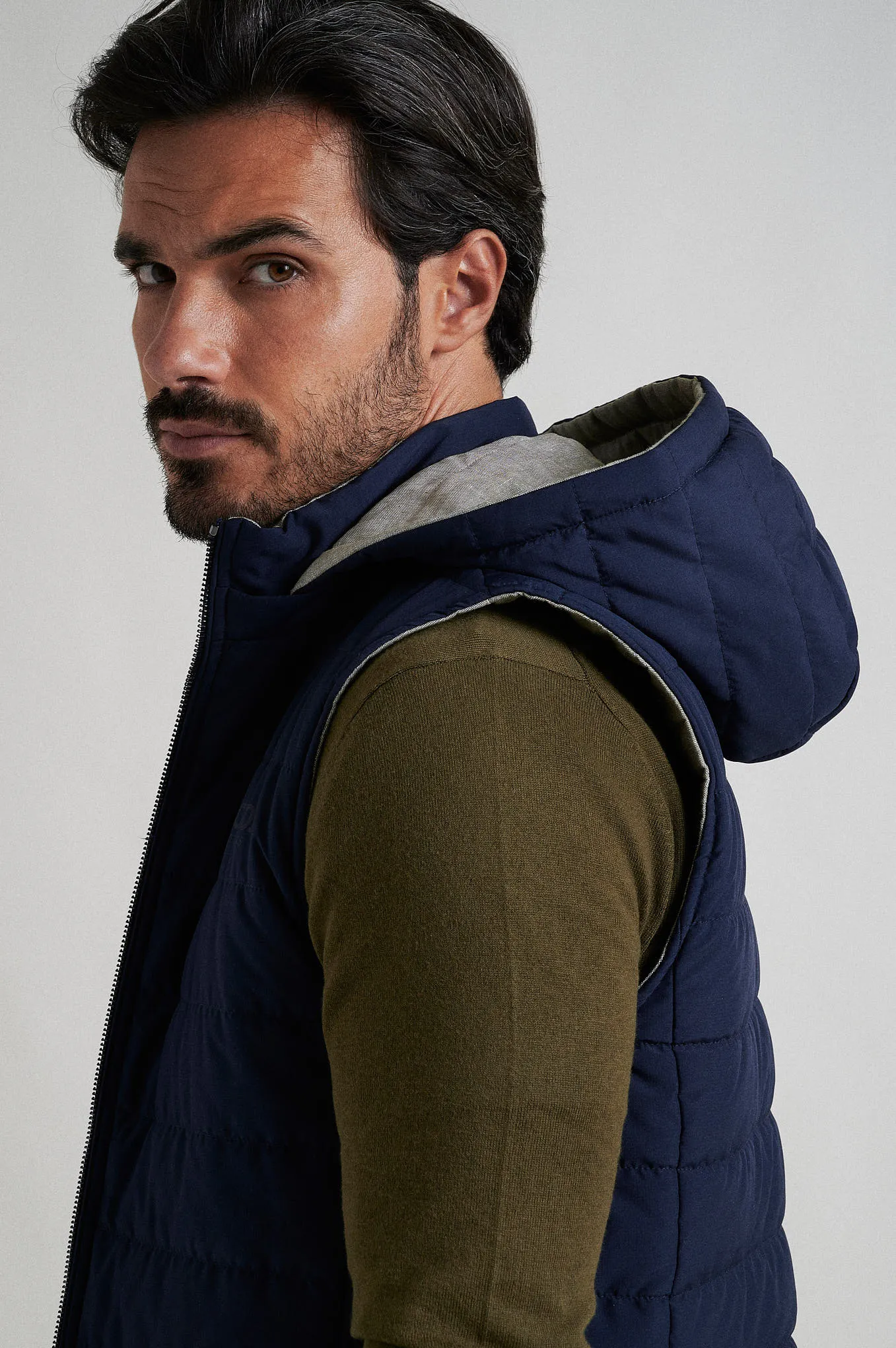 Quilted down vest in recycled polyester Respekt line