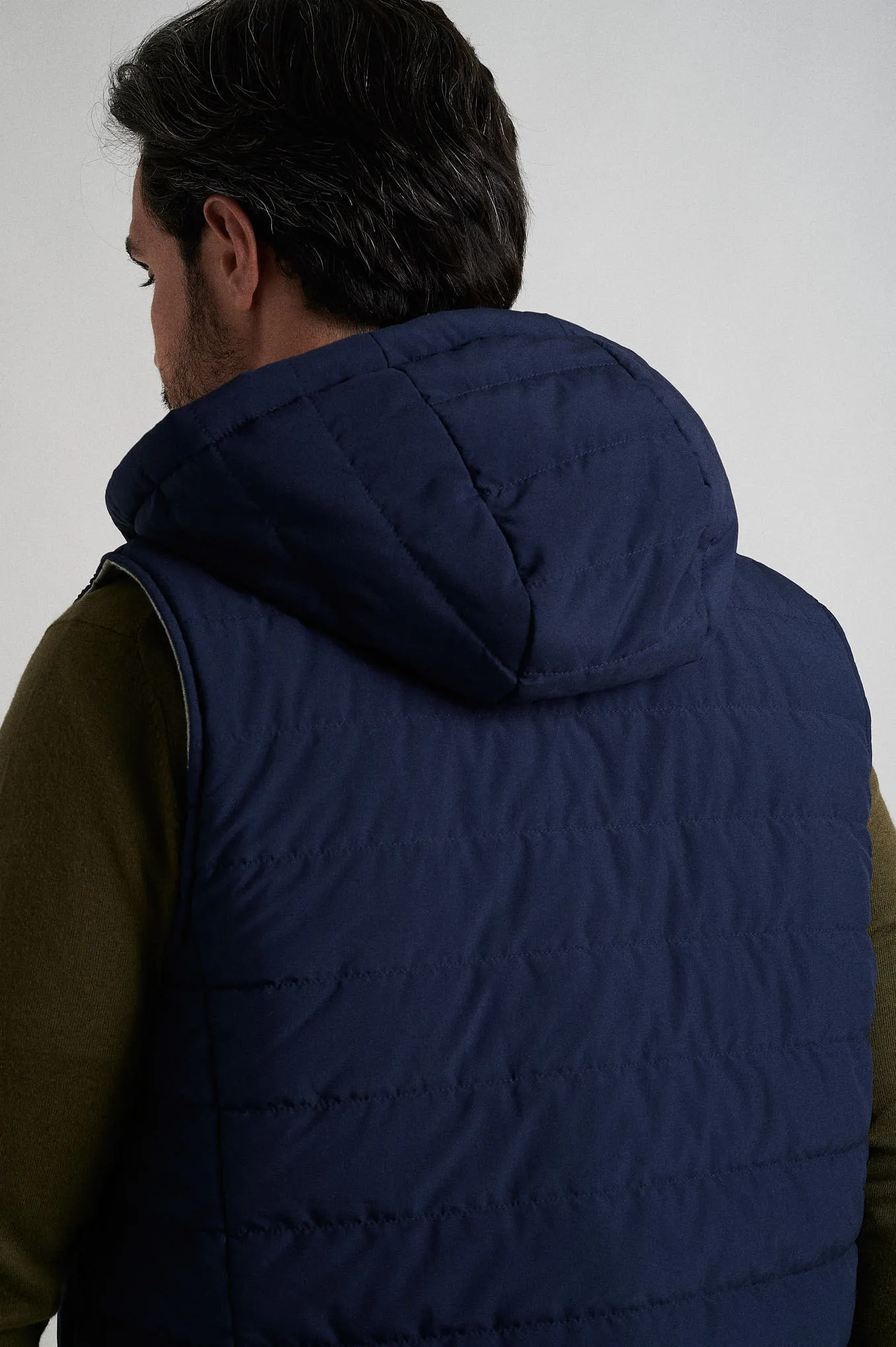 Quilted down vest in recycled polyester Respekt line